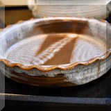 K07. Signed brown and white pottery baking dish. - $14 